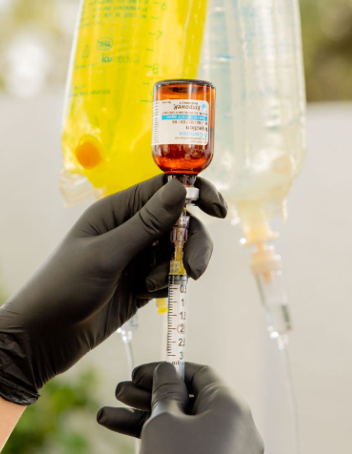 filling a syringe from a vial